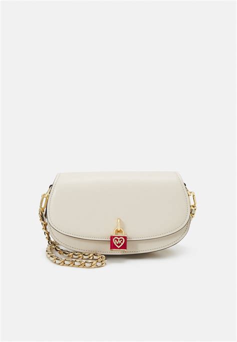 sac michael kors bandoulière beige|Michael Kors handbags.